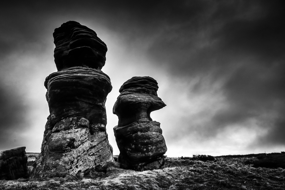 The image shows Sypeland Crags, also known as Jenny Twigg and her Daughter Tibb. https://www.ephotozine.com/photo/jenny-twig-and-her-daughter-tib-42423948